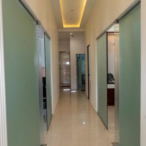 Clean clinic corridor with consultation and diagnostic rooms at Sara Diagnostics, Kharadi Pune